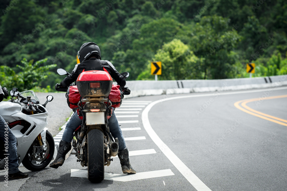 motorcycle on the road rides away. Travel on vacation, enjoy the nature trail. motorcycle in a sunny motorbike on the road riding.with sunset light. copyspace for your individual text. motorcycle on the road rides away. Travel on vacation, enjoy the nature trail. motorcycle in a sunny motorbike on the road riding.with sunset light. copyspace for your individual text.
