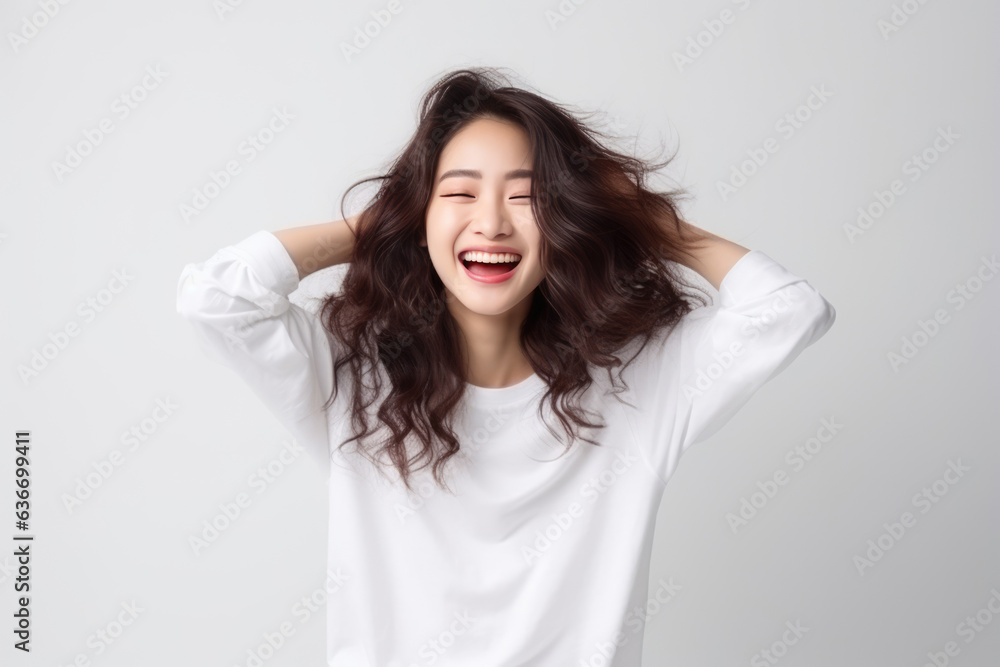 Happiness Asian Girl In White Jeans On White Background Happiness Asian Girl In White Jeans On White Background