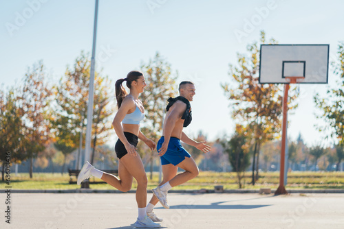 Running in the park on a sports court