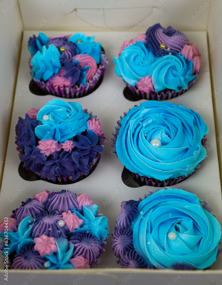 Cupcakes in a Box with Blue Frosting and Purple Ribbon (2).jpg