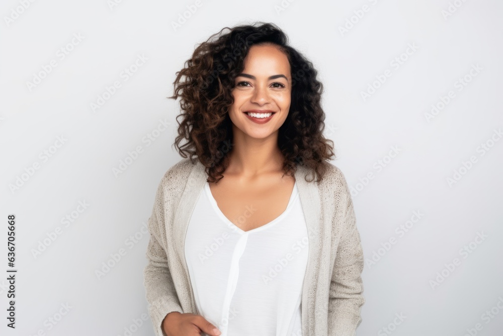Portrait of smiling young woman with curly hair standing against white background Portrait of smiling young woman with curly hair standing against white background