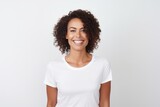 Medium shot portrait of a Brazilian woman in her 40s in a white background wearing a casual t-shirt