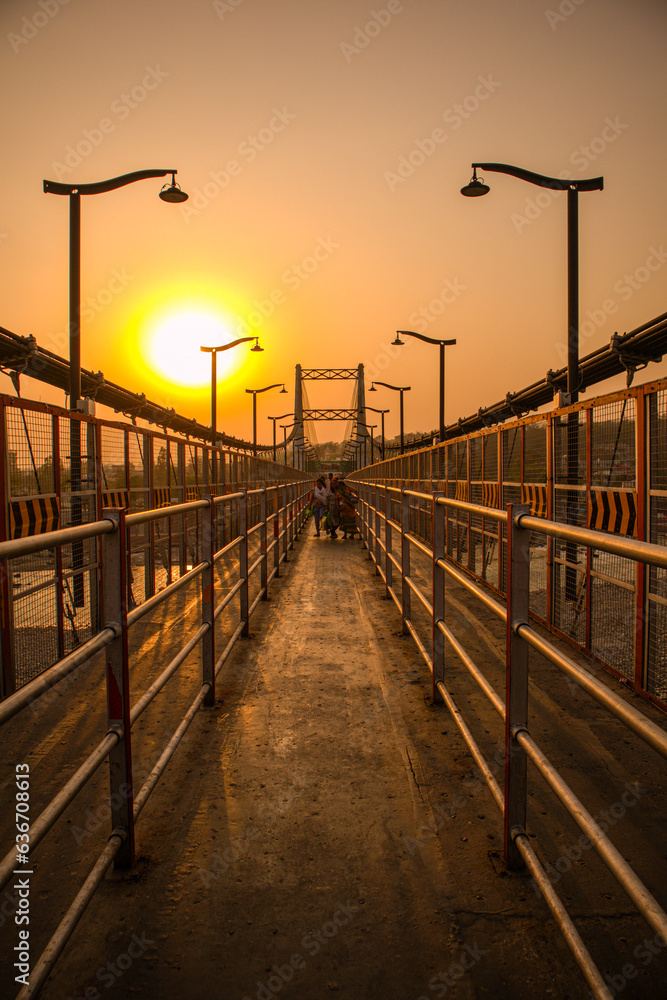 Obraz premium Sunset from Janki Setu bridge Rishikesh