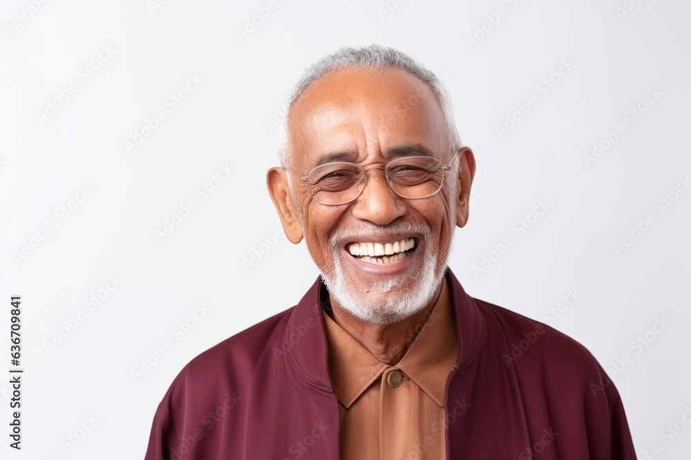 Portrait of a happy senior asian man smiling on white background Portrait of a happy senior asian man smiling on white background