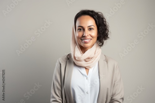 Portrait of a smiling african american businesswoman wearing a scarf