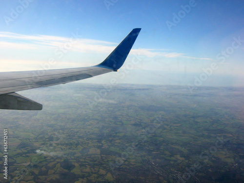 view from the window of the aircraft on the wing and on the ground