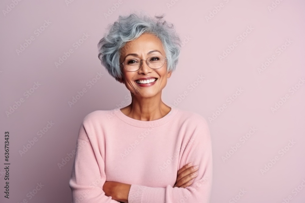 Portrait of smiling senior woman with blue hair and eyeglasses Portrait of smiling senior woman with blue hair and eyeglasses