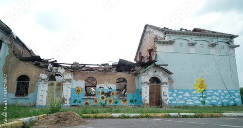 Palace of Culture. Devastated exterior of the House of Culture in Irpin. Aerial. Ukraine. War in Ukraine.  photo