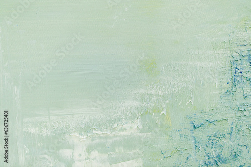 Abstract green and blue art background. Oil painting on canvas. Blue, yellow and white texture. Fragment of artwork. Spots of acrylic paint. Modern art. Contemporary art. Oil paint