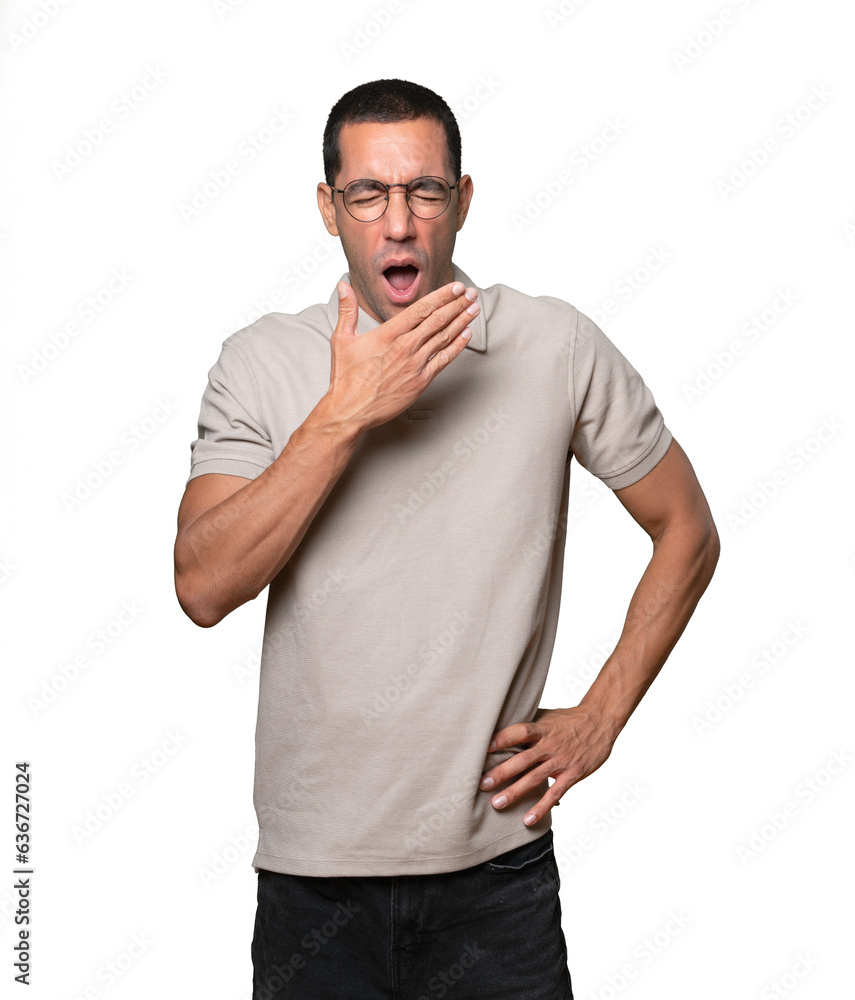 Friendly young man doing a gesture of keep calm Friendly young man doing a gesture of keep calm