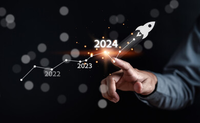 Pointing Happy New year 2024 with chart graph and countdown merry christmas and happy new year, Planning and challenge strategy business in new year 2024 Concept.