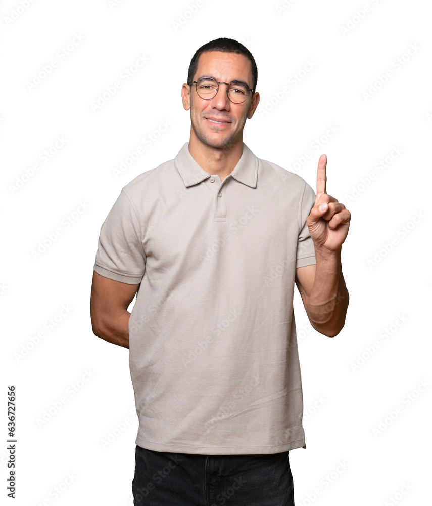 Young man making a number two gesture Young man making a number two gesture