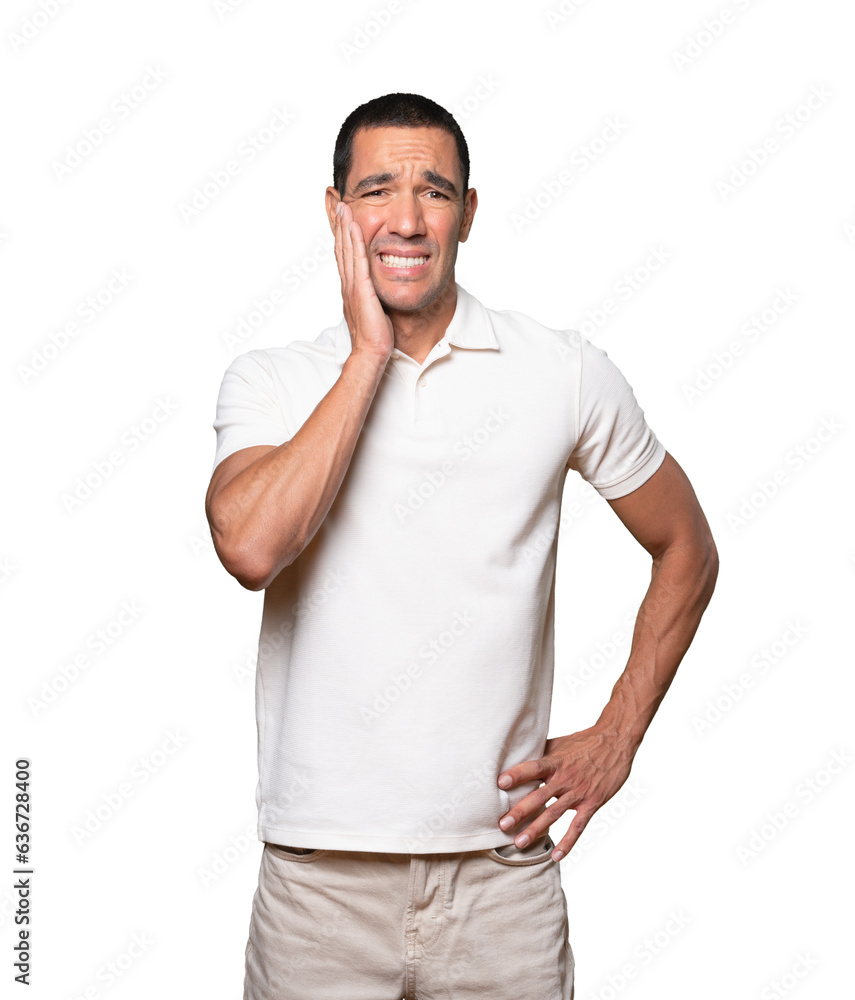 Concerned young man doing a gesture of relief Concerned young man doing a gesture of relief