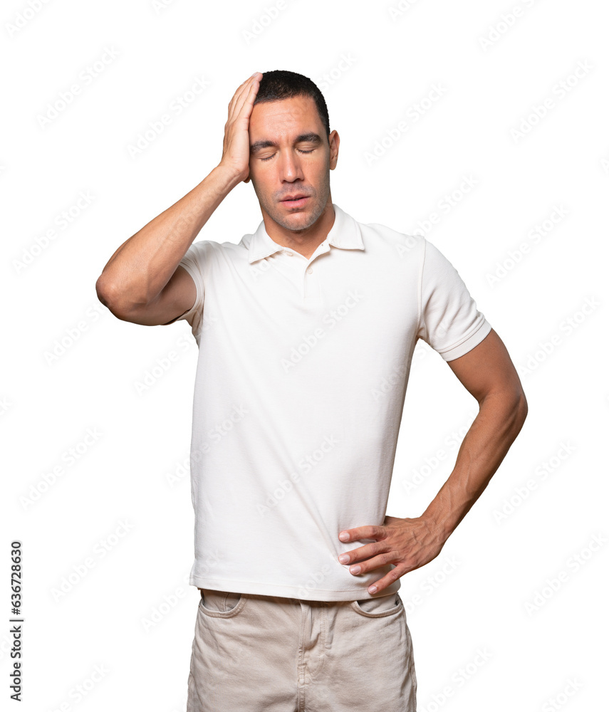 Depressed young man posing against background Depressed young man posing against background