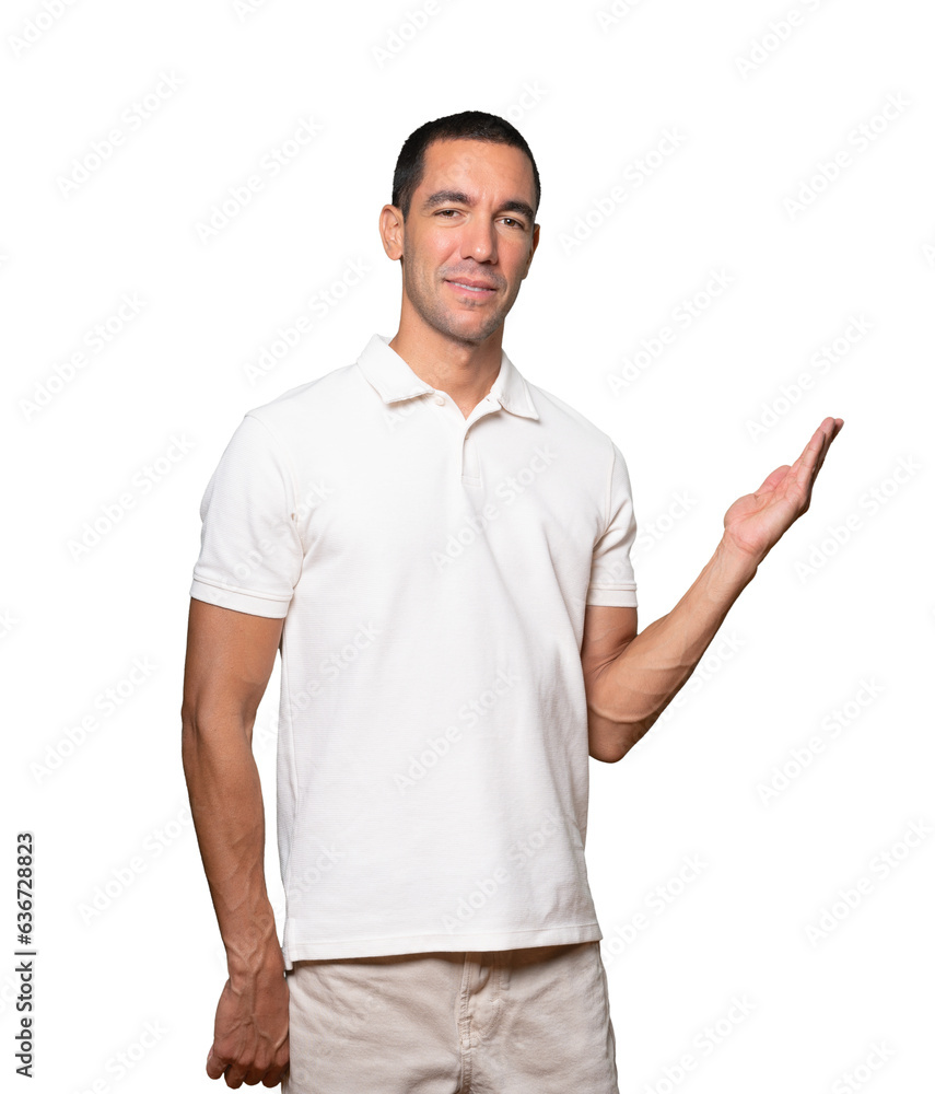 Friendly young man making a gesture of welcome Friendly young man making a gesture of welcome