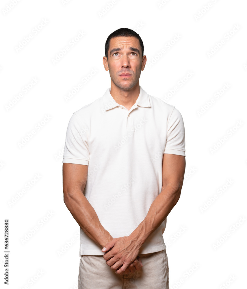 Serious young man looking against background Serious young man looking against background