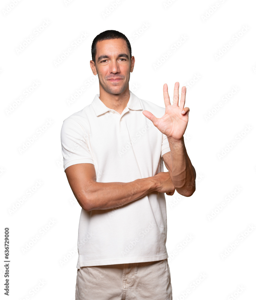 Young man making a number four gesture Young man making a number four gesture