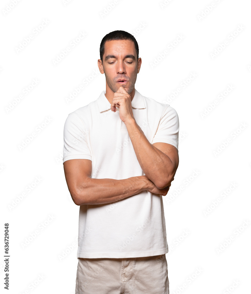 Concerned young man posing against background Concerned young man posing against background