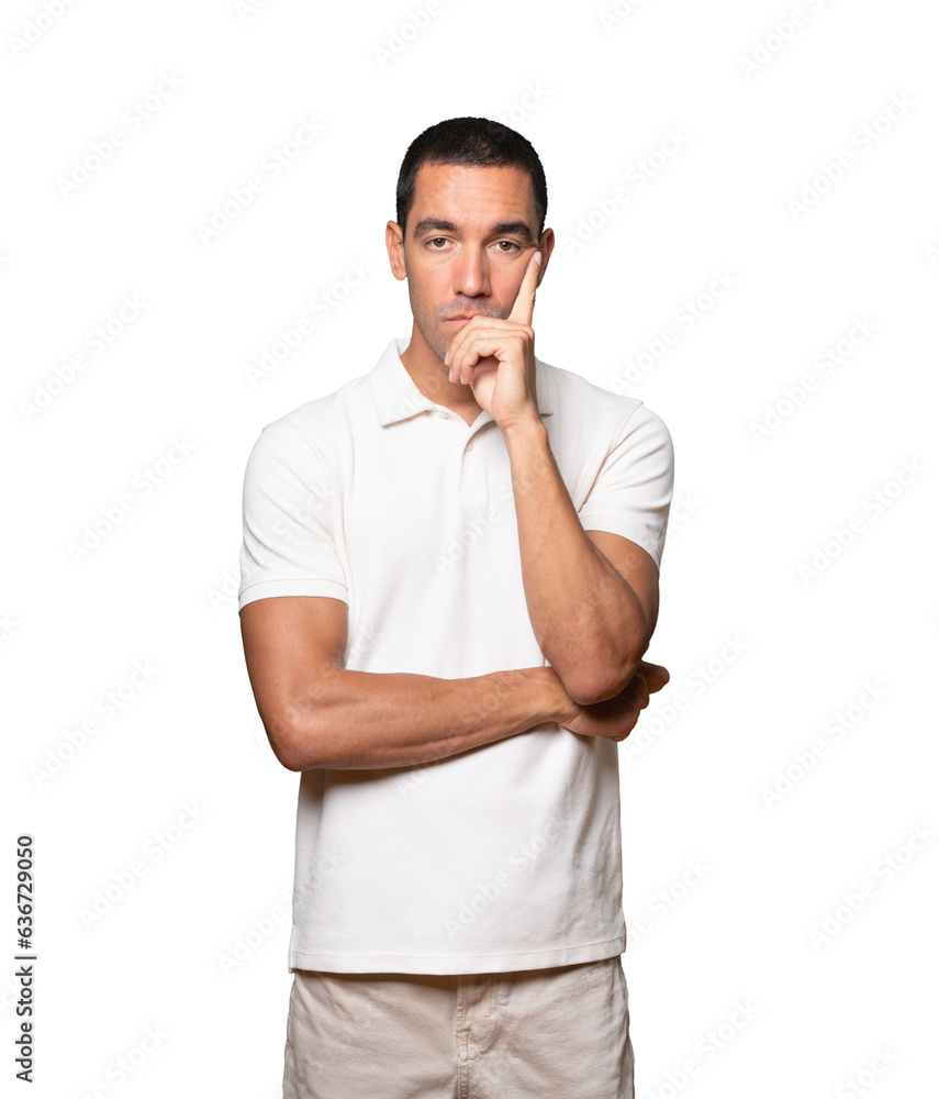 Concerned young man posing against background Concerned young man posing against background