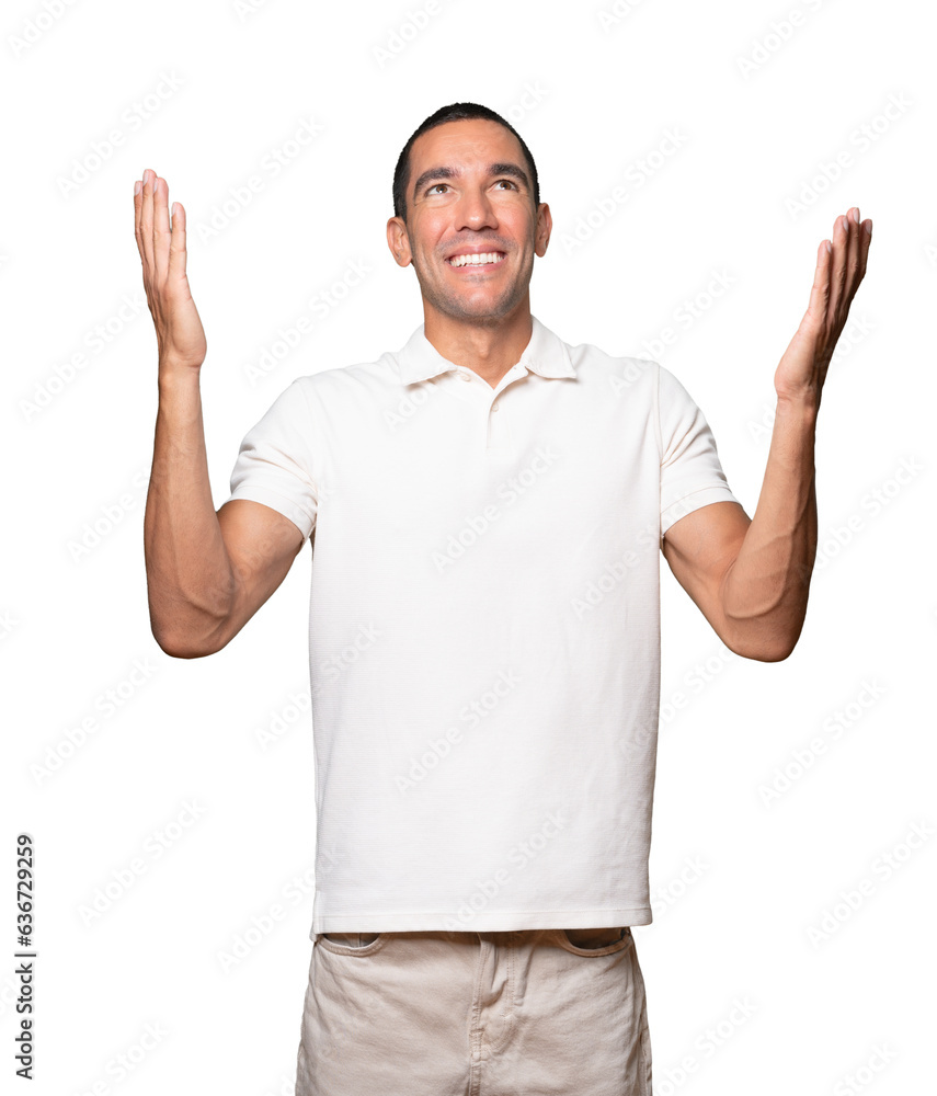 Astonished young man looking up Astonished young man looking up
