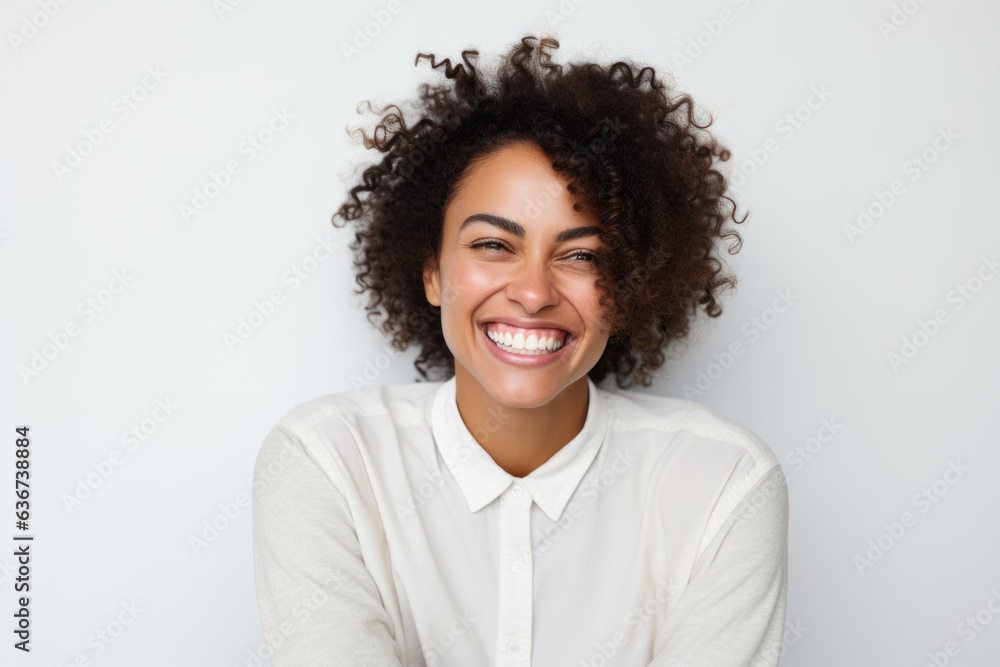 Portrait of a smiling young afro american woman against white background Portrait of a smiling young afro american woman against white background