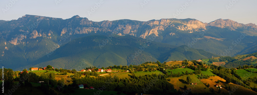Scenic view over Bucegi Mountains (Muntii Bucegi) in Romania in a sunny sunset summer day, Romania, Europe