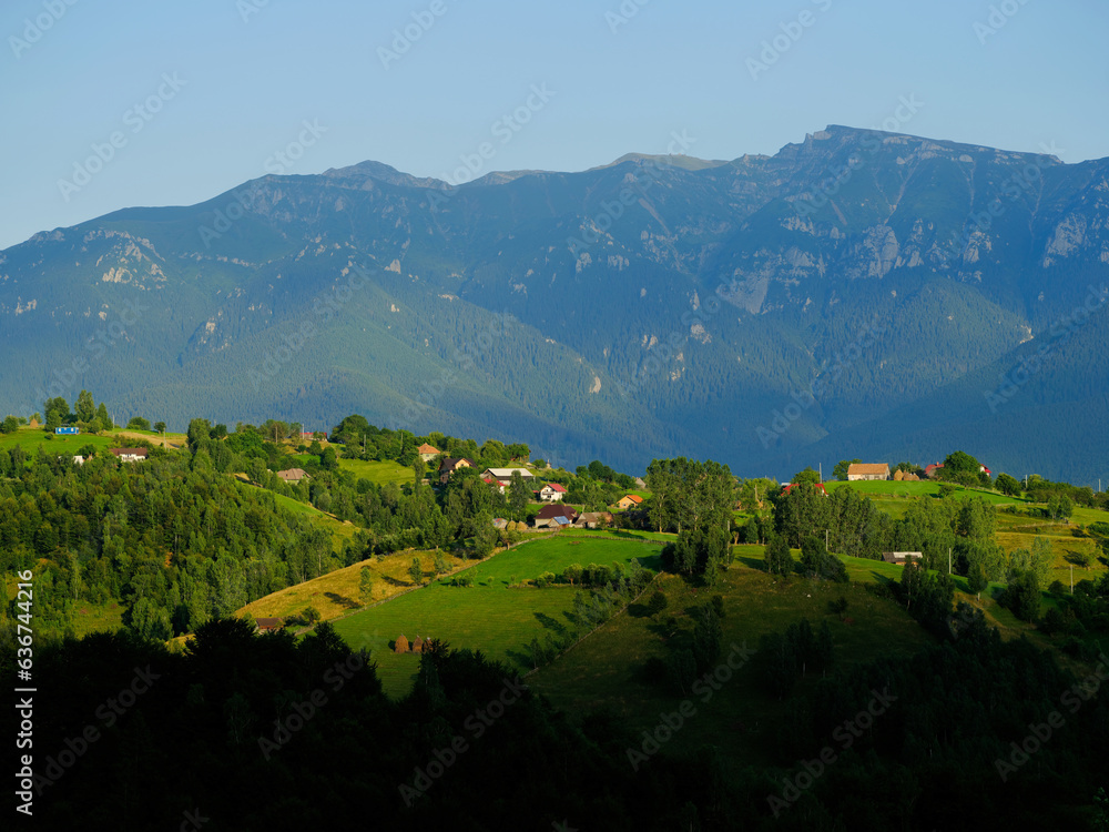 Naklejka premium Scenic view over Bucegi Mountains (Muntii Bucegi) in Romania in a sunny sunset summer day, Romania, Europe