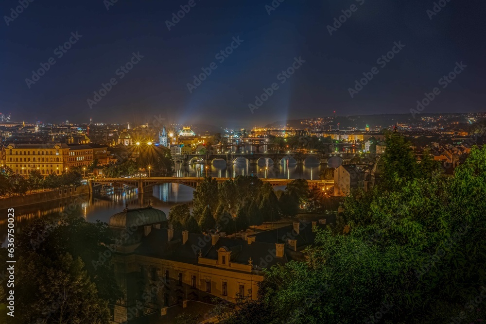 Scenic view of bridges over Vltava river in Prague, Czechia at night
