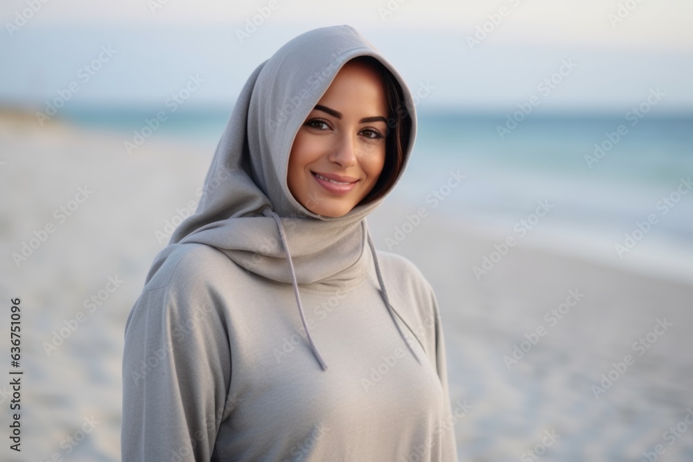 Portrait of a beautiful muslim woman in a hijab on the beach Portrait of a beautiful muslim woman in a hijab on the beach