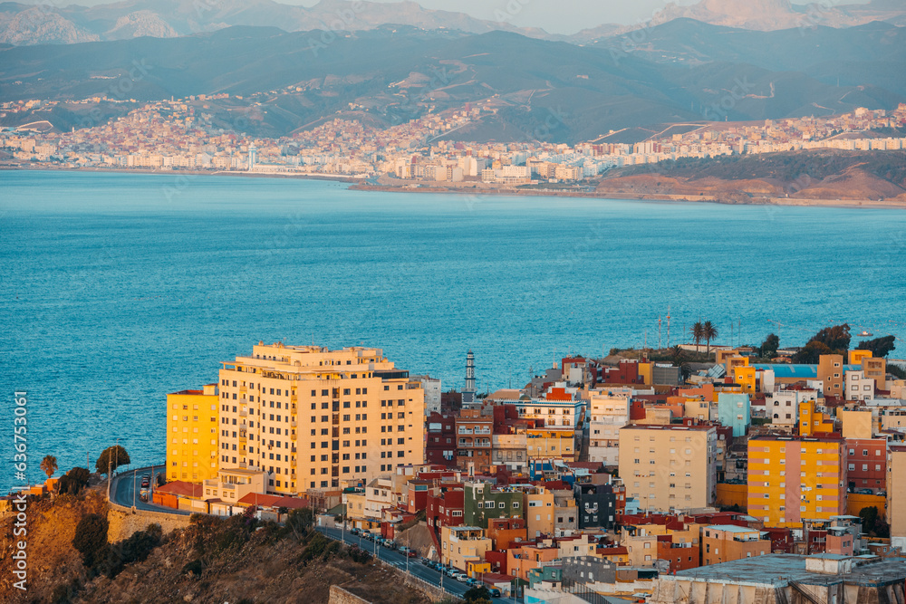Close view of the Recinto neighborhood in Ceuta and the bay of Morocco in the background at sunrise