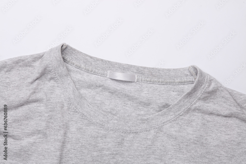 Collar of a gray t-shirt close-up on a white background Collar of a gray t-shirt close-up on a white background