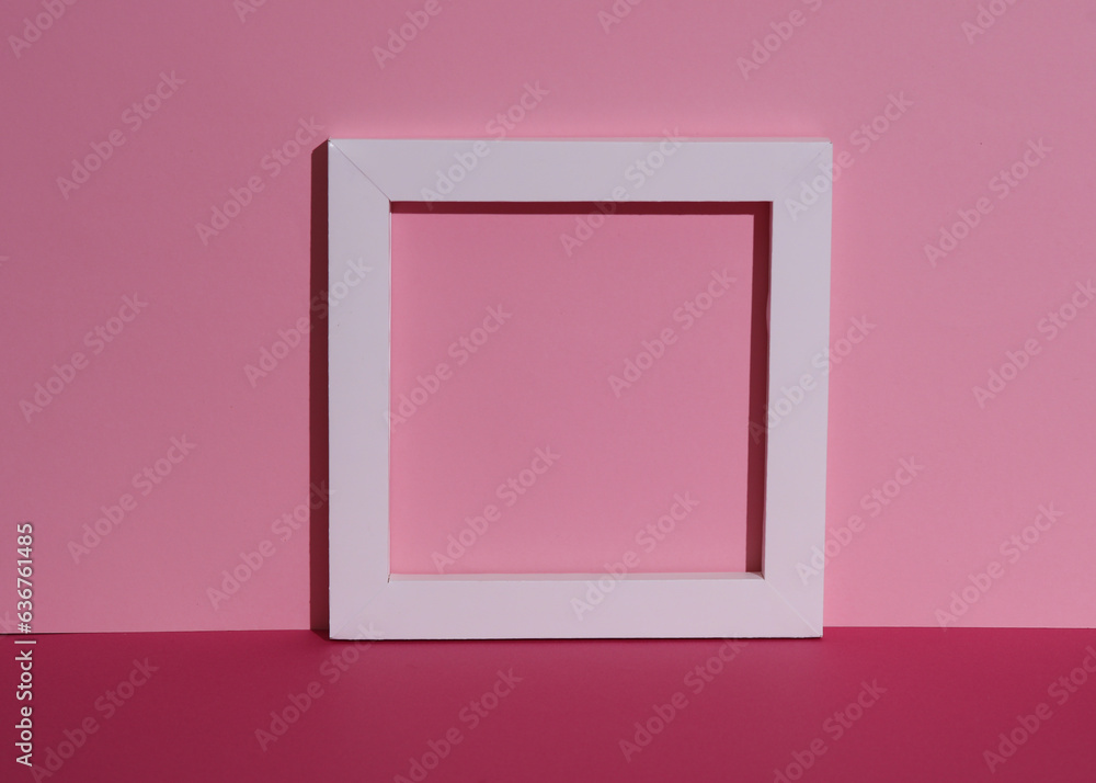 White frame on pink background with shadow. Creative layout, minimalism White frame on pink background with shadow. Creative layout, minimalism