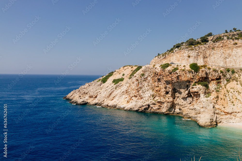 Beautiful seascape on a sunny day In Turkey. The Mediterranean Sea, surrounded by mountains, with picturesque islands on a summer day. Summer background with blue ocean