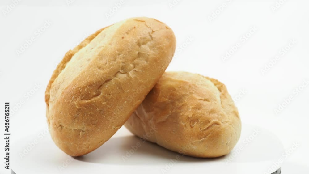 Rotating buns on a white background. Buns close-up. Rotating buns on a white background. Buns close-up.