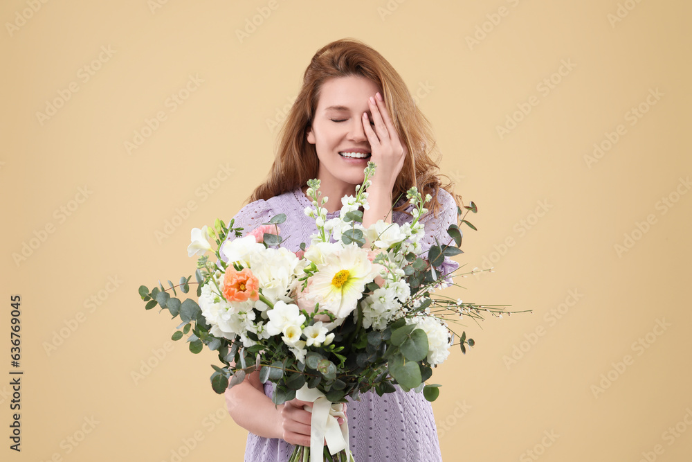 Beautiful woman with bouquet of flowers on beige background Beautiful woman with bouquet of flowers on beige background
