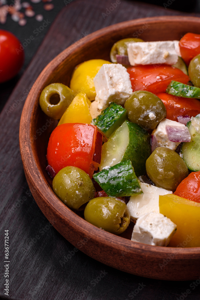 Delicious fresh, juicy Greek salad with feta cheese, olives, tomatoes, cucumber