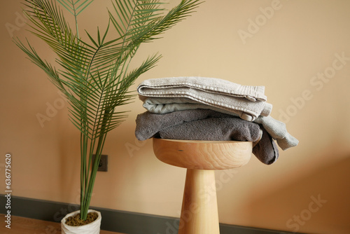 pile of gray and white color shower towel 