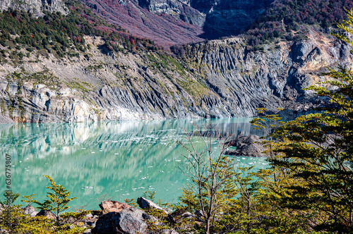 View of the base of Cerro Tronador, stratovolcano, geologically inactive. Manso Glacier and Black Glacier. The Manso Lake, emerald green in color, due to the sediment content with copper sulfate. photo