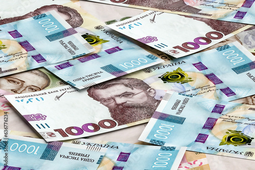 Stack of ukrainian money hryvnia (grivna, hryvna) with 1000 banknotes. Finance