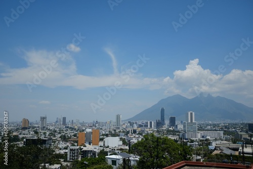 Skyline of Monterrey with Cerro de la Silla mountain in the background. Mexico.