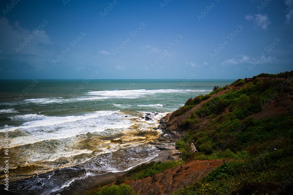 Breathtaking aerial view of a beautiful landscape with a stunning view of the ocean in Goa