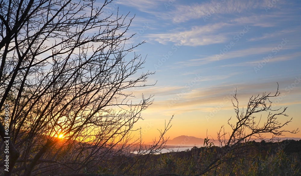 Obraz premium Beautiful shot of a sunrise over Tarifa and Jabal Musa mountain