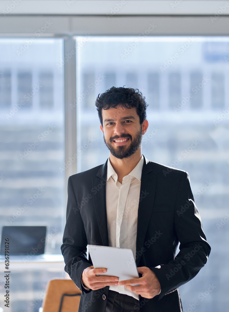 Happy professional young latin business man company employee, male corporate manager, businessman office worker looking at camera holding digital tablet standing in office, vertical portrait. Happy professional young latin business man company employee, male corporate manager, businessman office worker looking at camera holding digital tablet standing in office, vertical portrait.