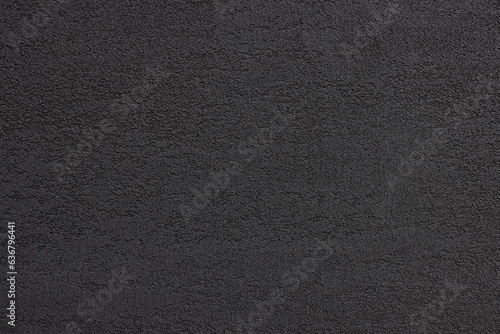 ざらついた黒い壁面、背景素材