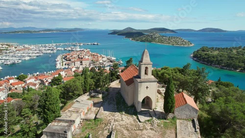 St. Nicholas church and the old town of Tribunj in Dalmatia region of Croatia photo