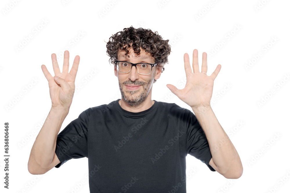 Middle-aged man making the number eight with his fingers, on white background. Middle-aged man making the number eight with his fingers, on white background.