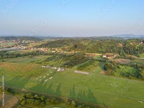 View of forests, fields, villages and Zagorje hills, during a panoramic balloon flight over Croatian Zagorje - Croatia (Panoramski let balonom iznad Hrvatskog zagorja - Hrvatska) photo