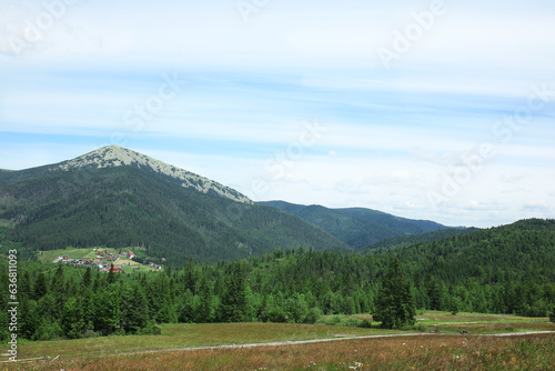 Mountain landscape with vil...