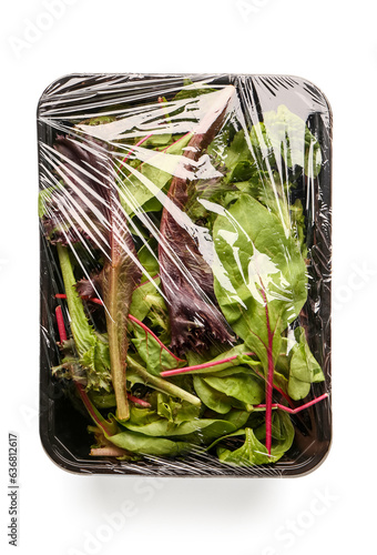 Fresh salad leaves covered ...
