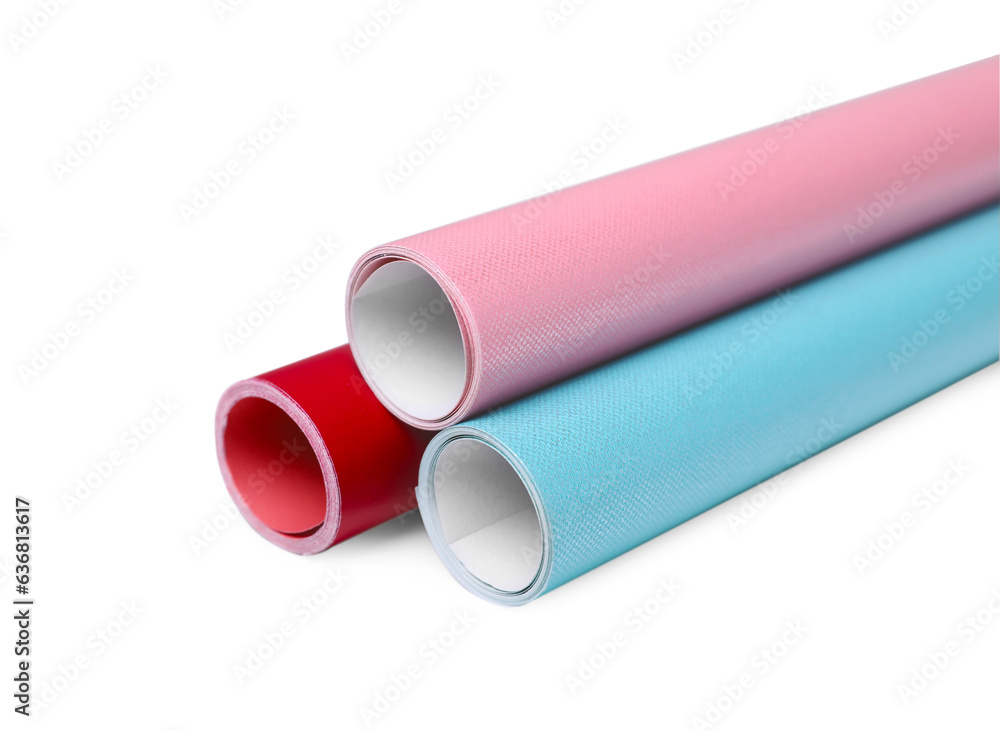 Rolls of colorful wrapping papers on white background, closeup Rolls of colorful wrapping papers on white background, closeup
